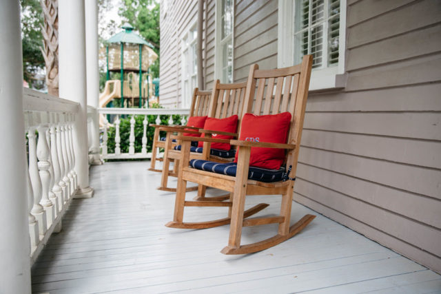 three rocking chairs on moore house porch
