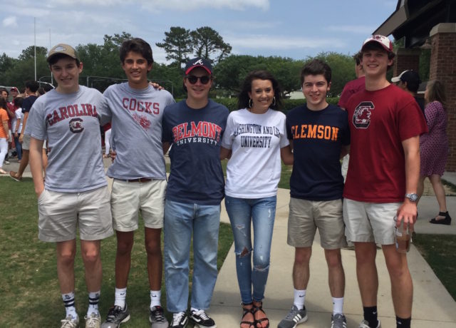 porter gaud students pose in their college shirts