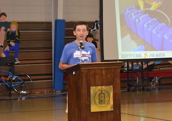 scotty parker addresses students during compassion weekend assembly