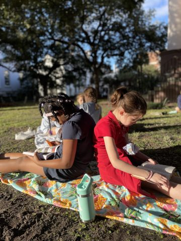 Charleston Day School students finish Read-a-Thon by reading in the park